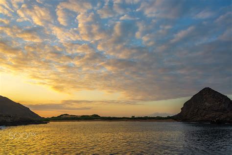 Sunrise over Sullivan Bay at Bartolome Island in the Galapagos. 28mm, ƒ ...