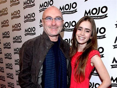 Lily Collins posts throwback photo of father Phil’s Oscar win | Express & Star