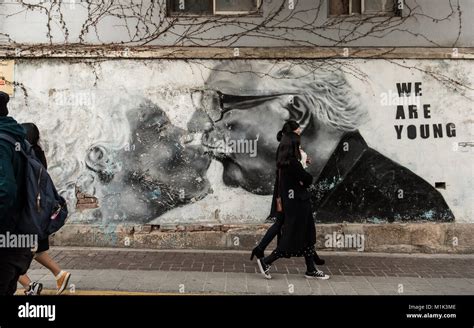 People walk past street art in Seoul, South Korea Stock Photo - Alamy