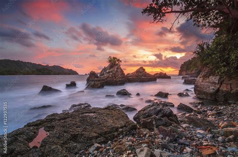 Amazing stones at beach in sunset. Locations in Pegadung Beach Lampung ...