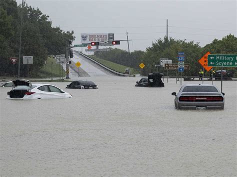 Heavy rain floods streets across the Dallas-Fort Worth area