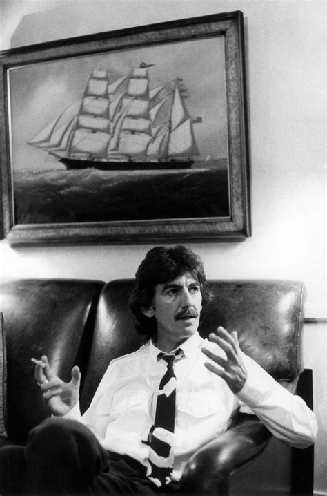 Portrait of George Harrison in his office London 1982 during an interview | Beatles george ...