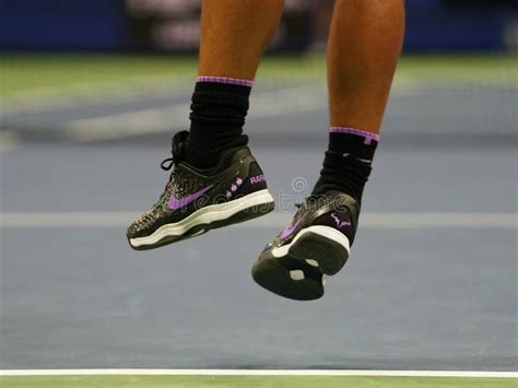 18-time Grand Slam Champion Rafael Nadal of Spain Wears Custom Nike Tennis Shoes during the 2019 ...