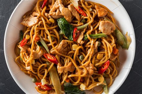 wok stir-fry egg noodles with fried | High-Quality Food Images ~ Creative Market