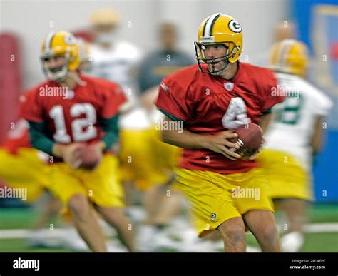 Green Bay Packers quarterbacks Brett Favre (4) and Aaron Rodgers (12 ...