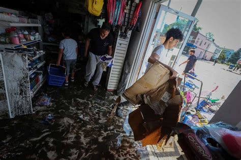 Photos show deadly floods, destruction in Northeast caused by remnants ...