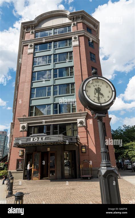 Exterior of Roxy Hotel building (formerly Tribeca Grand) and clock in Tribeca (2 Avenue of the ...