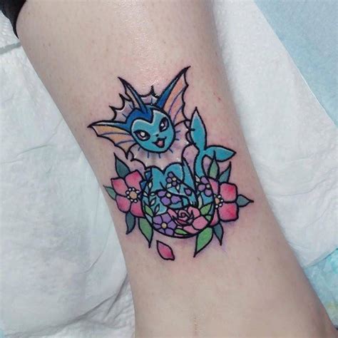 Kawaii style vaporeon tattoo on the leg.