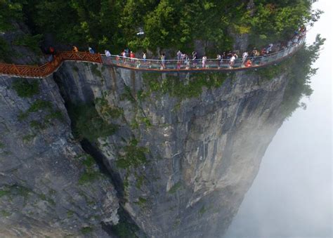 China's glass walkway opens in Tianmen mountain - BBC News