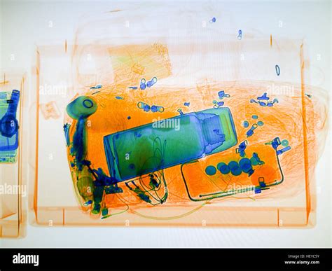 Scanned baggage on the x-ray scanner screen Stock Photo: 129680039 - Alamy