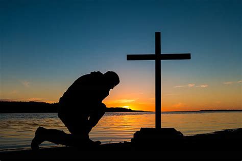 Best Kneeling In Prayer Stock Photos, Pictures & Royalty-Free Images ...