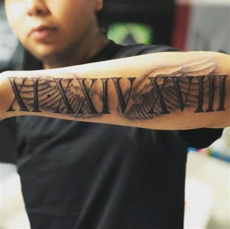 Roman Numerals For Men Over Arm | Roman numeral tattoos, Roman numeral tattoo font, Hand tattoos ...