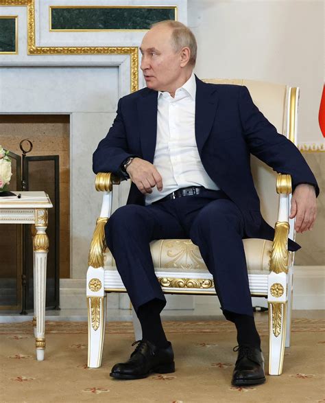 Putin Mocked in Russian Media Over Length of His Pants - Newsweek