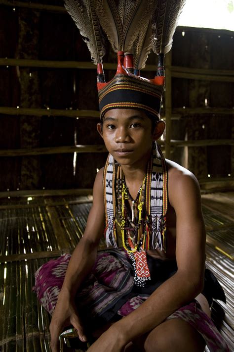 Malaysian boy in traditional dress and headwear. Malaysia Truly Asia ...