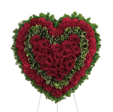 Enchanted Florist Heart shaped funeral flowers with red roses