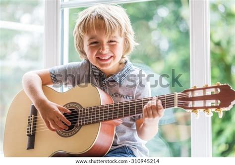 22,386 Guitar Child Playing Stock Photos, Images & Photography | Shutterstock