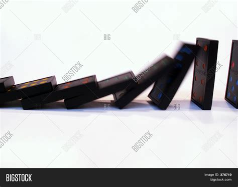 Dominoes Falling Image & Photo (Free Trial) | Bigstock