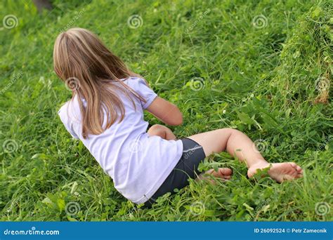 Barefoot Woman Laying Grass