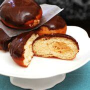 Chocolate-Glazed Peanut Butter-Stuffed Donuts by The Redhead Baker