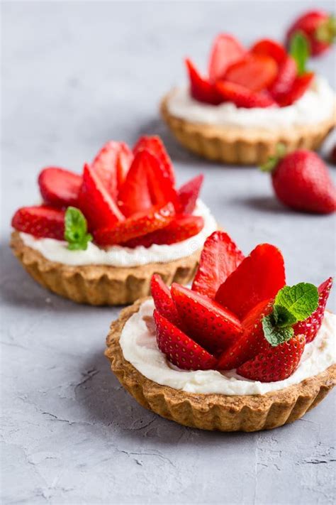 Strawberry Vanilla Cream Cheese Tarts Over Light Gray Table Stock Image ...