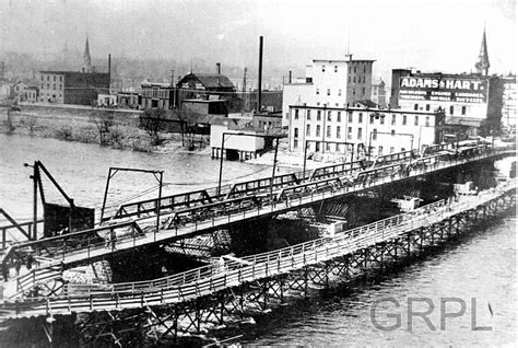 Demolition of Bridge St. Wrought Iron Bridge | History Grand Rapids