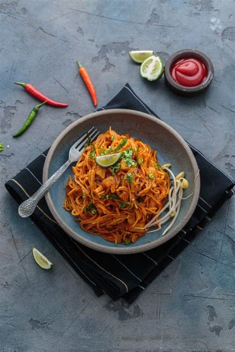 Indian Mee Goreng, Spicy Fried Noodles in a Plate, Singaporean and Malaysian Cuisine Copy Space ...