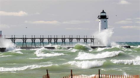 Manistee lighthouse waves and ice