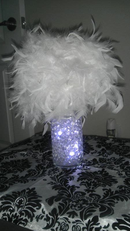 My DIY Feather Centerpiece | Weddingbee Do It Yourself | Feather centerpieces, Centerpieces ...