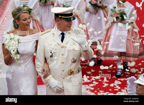 Monaco's Prince Albert II and Princess Charlene leave after the religious wedding ceremony at ...