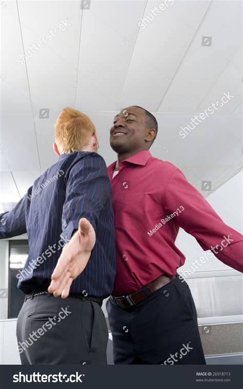 Multi-ethnic Businessmen Chest Bumping Stock Photo 26918713 | Shutterstock