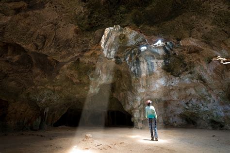 Woman In Quadirikiri Cave Arikok National Park Aruba Stock Photo - Download Image Now - iStock