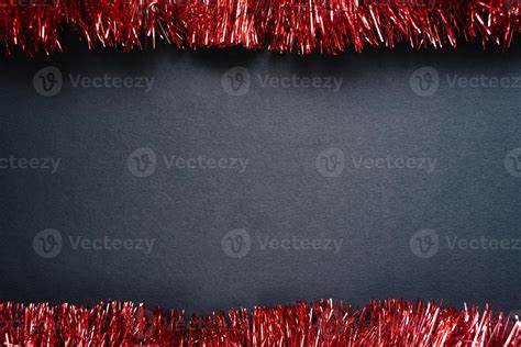 red tinsel frame on black paper background 7150489 Stock Photo at Vecteezy