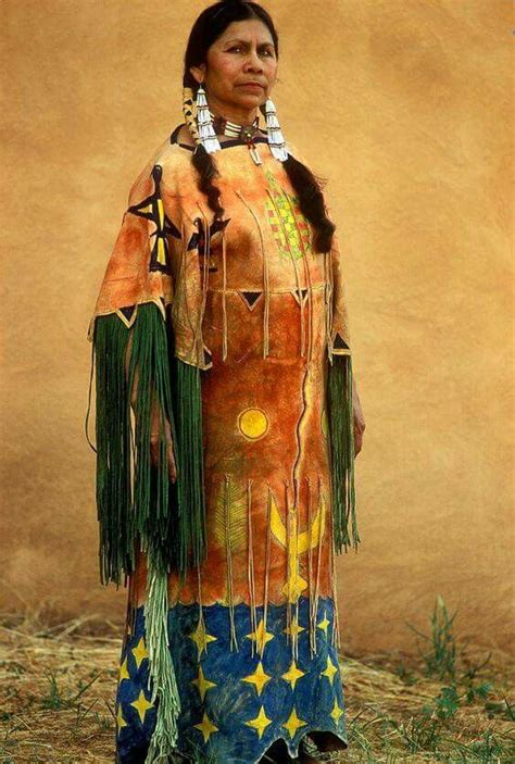 A Kiowa woman wears a Ghost Dance Dress. Honor tradition. Native ...