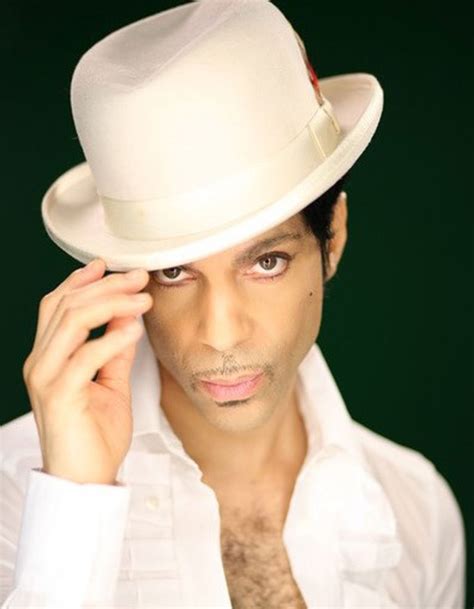 Prince Portrait in White Hat II (Hand Up) Paisley Park, MN, 2009 | San Francisco Art Exchange