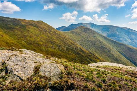 Stones on the Edge of Mountain Cliff Stock Photo - Image of majestic, green: 90152542