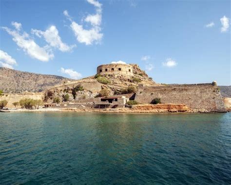 Elounda, Spinalonga Island and Agios Nikolaos cruise with barbecue ...