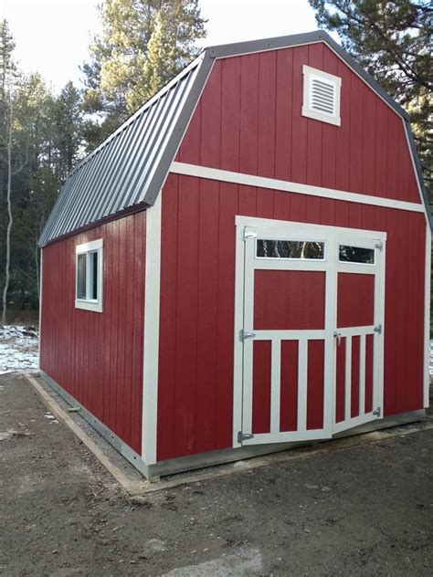 Love this red storage barn! Traditional style with modern additions like transom windows. Pool ...