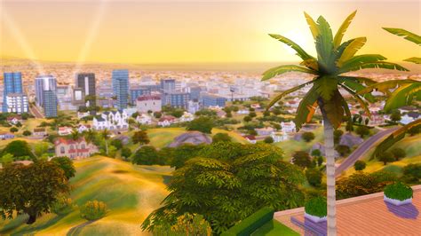 an aerial view of a city with palm trees in the foreground and buildings in the background