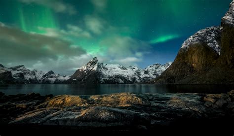 [OC] Starlight, moonlight and Northern Lights over Reinefjorden and Olstinden - Reine, Norway by ...