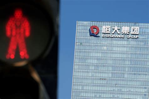 Cost of borrowing Evergrande stock hits new high on debt fears | Reuters