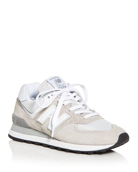 New Balance Women's Classic 574 Suede Lace Up Sneakers in White - Lyst