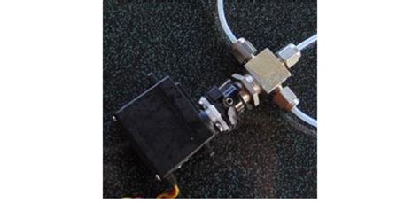 Servo connected to the valve. | Download Scientific Diagram