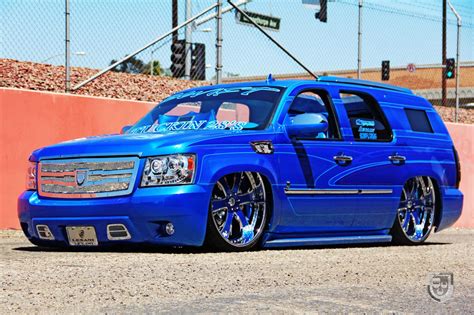 Dropped Royal Blue Chevy Tahoe on Color Matched Wheels — CARiD.com Gallery