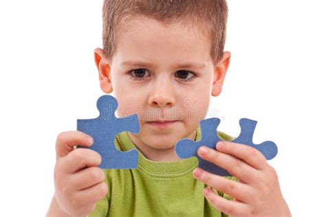 Boy with puzzles stock photo. Image of problems, play - 18035602