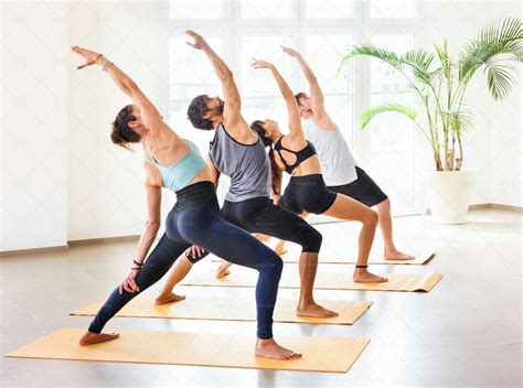 Yoga Class Pracitcing Poses - Stock Photos | Motion Array