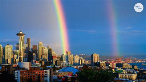 Stunning double rainbows stretch across the sky