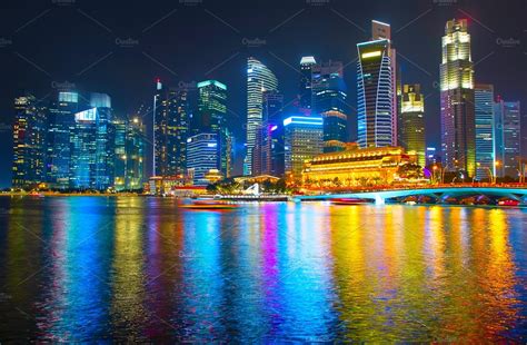 Singapore skyline at night containing night, singapore, and city ...