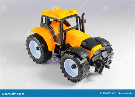 Yellow Tractor Model, Toy Isolated on White Background Stock Image ...