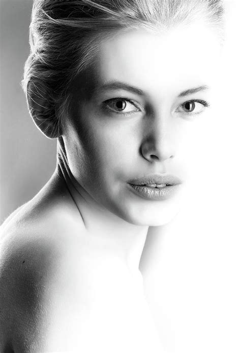 High contrast black and white portrait of a beautiful girl. Photograph by Vladimir Larionov ...