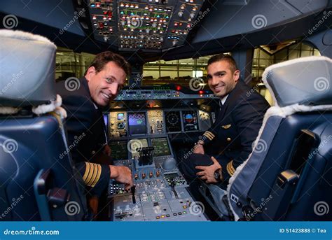 Pilots In Emirates Airbus A380 Aircraft After Landing Editorial Image | CartoonDealer.com #51423888